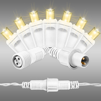 Warm White Icicle Lights - 8 ft. - 100 LED Mini Lights - White Wire - 22 Drops - 4 in. Drop Spacing - 3 in. Bulb Spacing - 120 Volt - 22 Max Connections - Commercial Duty - Coaxial connection requires one plug adapter (not included)